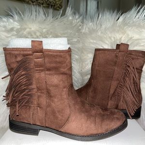Fun chocolate brown booties with castles on the outside of each